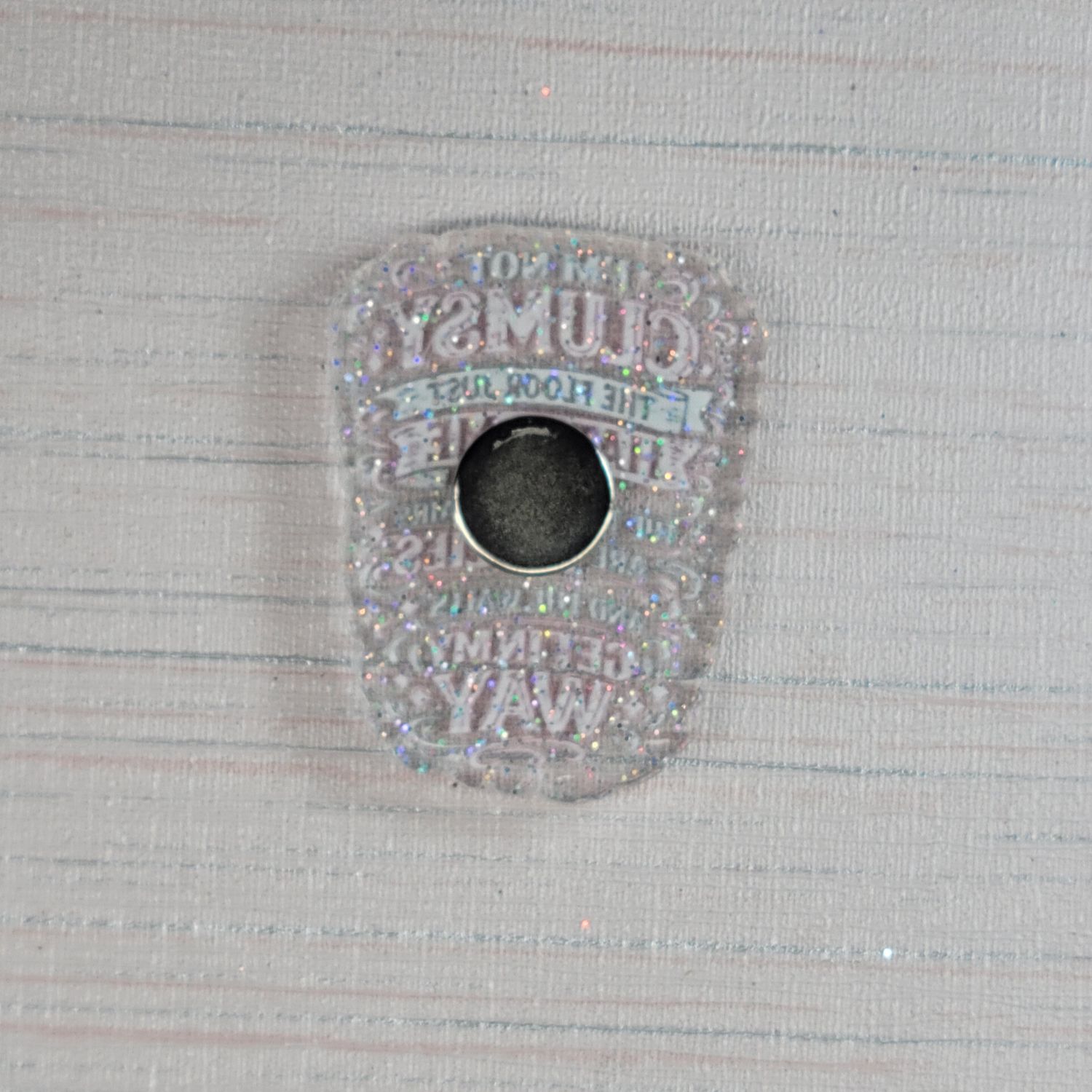 Cover Minder I'm not clumsy, the floor just hates me,  the table and chairs are bullies and the walls get in my way