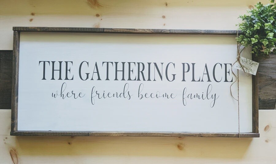 "The Gathering Place: Where Friends Become Family" Sign