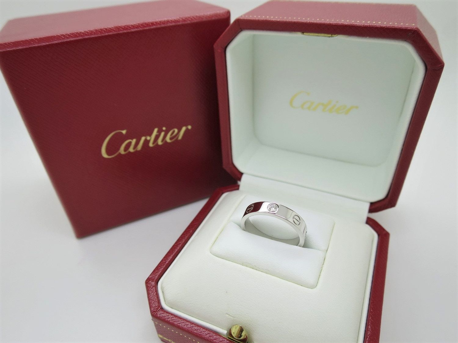 Cartier Love Ring in 18kt White Gold + Diamond in Band Size 5.5 comes with Certificate of Authenticity + Red Box
