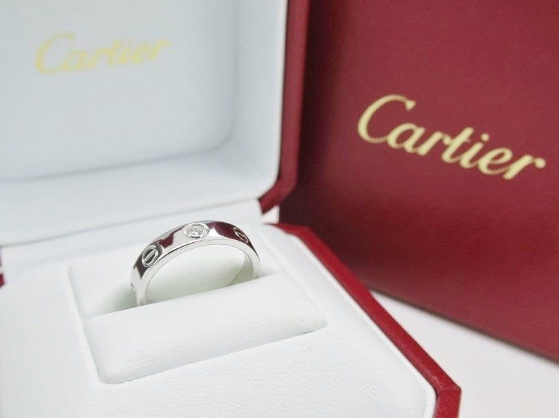 Cartier Love Ring in 18kt White Gold + Diamond in Band Size 5.5 comes with Certificate of Authenticity + Red Box