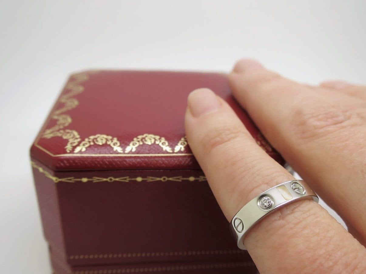 Cartier Love Ring in 18kt White Gold + Diamond in Band Size 5.5 comes with Certificate of Authenticity + Red Box