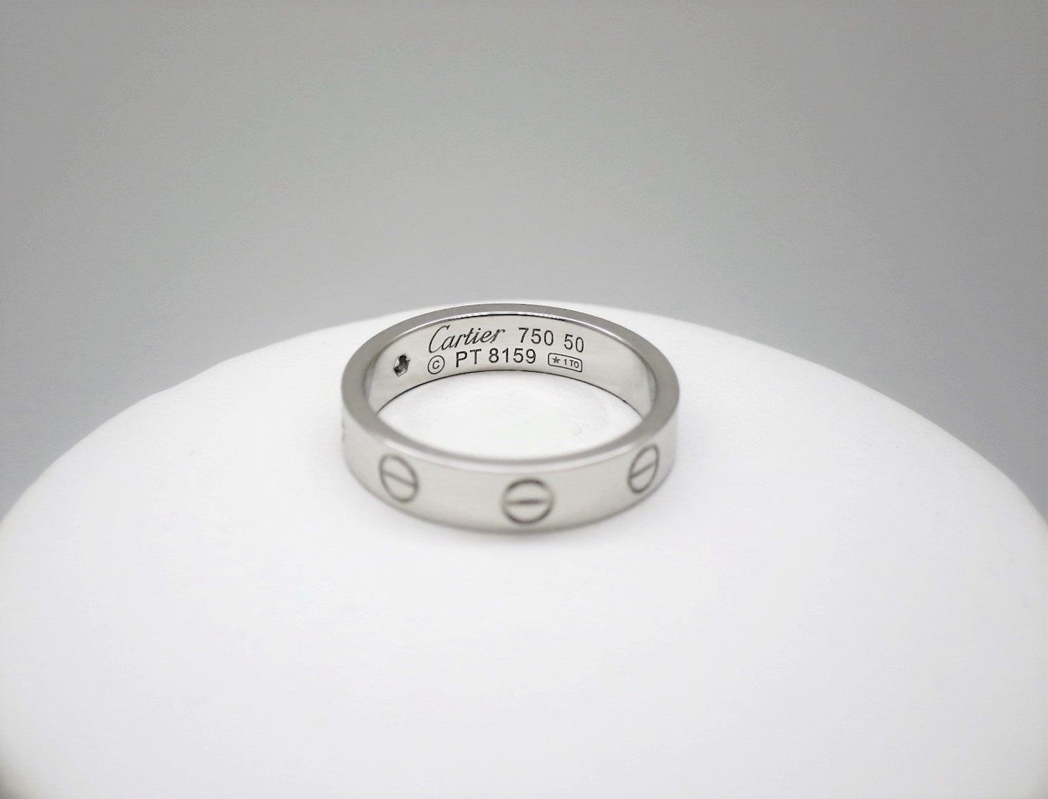 Cartier Love Ring in 18kt White Gold + Diamond in Band Size 5.5 comes with Certificate of Authenticity + Red Box