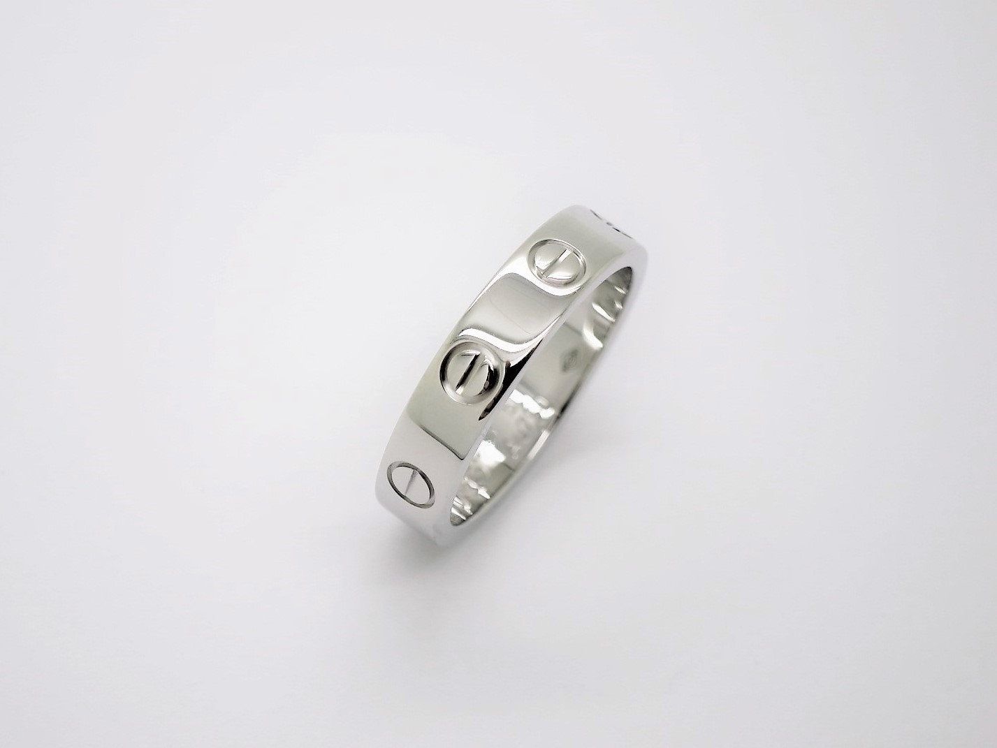 Cartier Love Ring in 18kt White Gold + Diamond in Band Size 5.5 comes with Certificate of Authenticity + Red Box
