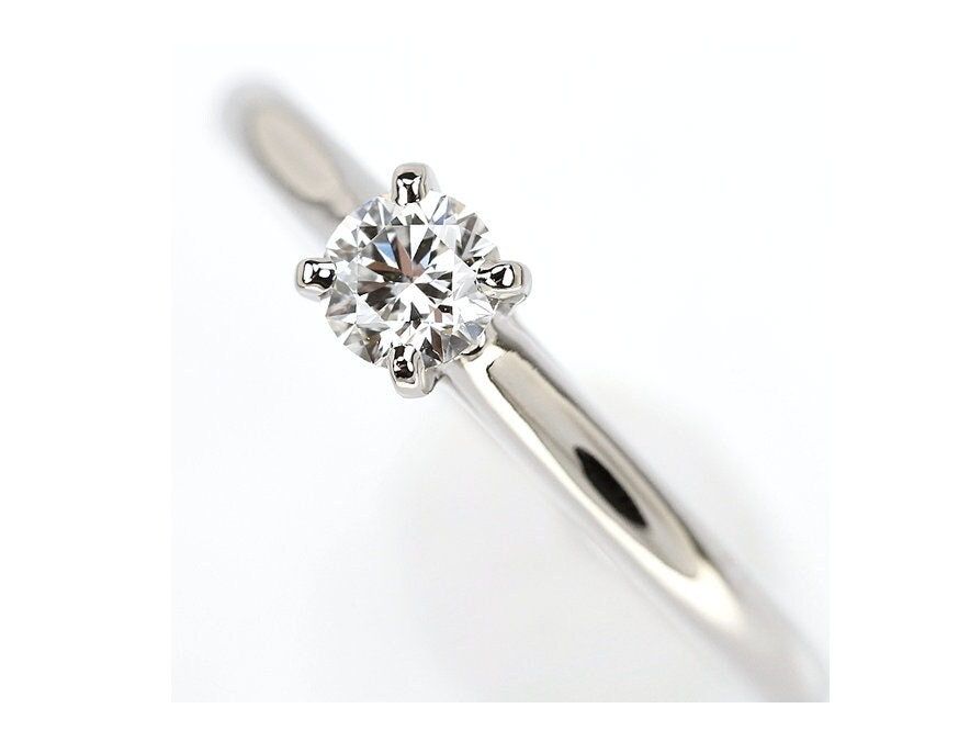 Cartier 1895 Solitaire Ring Platinum + 0.19ct Brilliant Cut Diamond in Band Size 4 comes with all Certificates and Box 