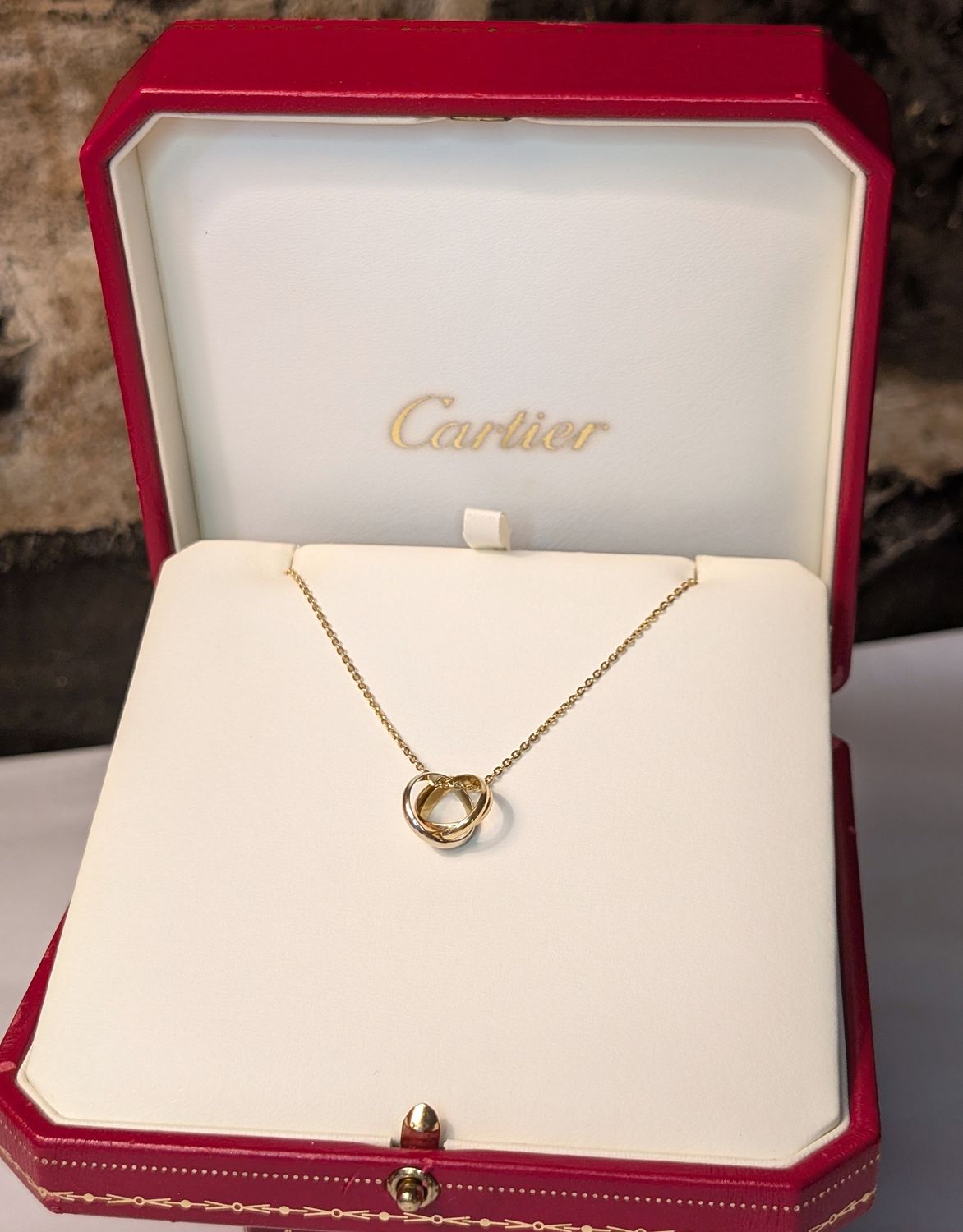 Circa 1997 Cartier necklace in beautiful vintage condition with original box.  18kt Gold Pendant &amp; Chain.  Made in France.