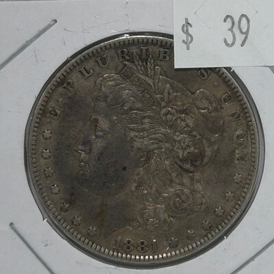 1881 Morgan Silver Dollar in cardboard protector