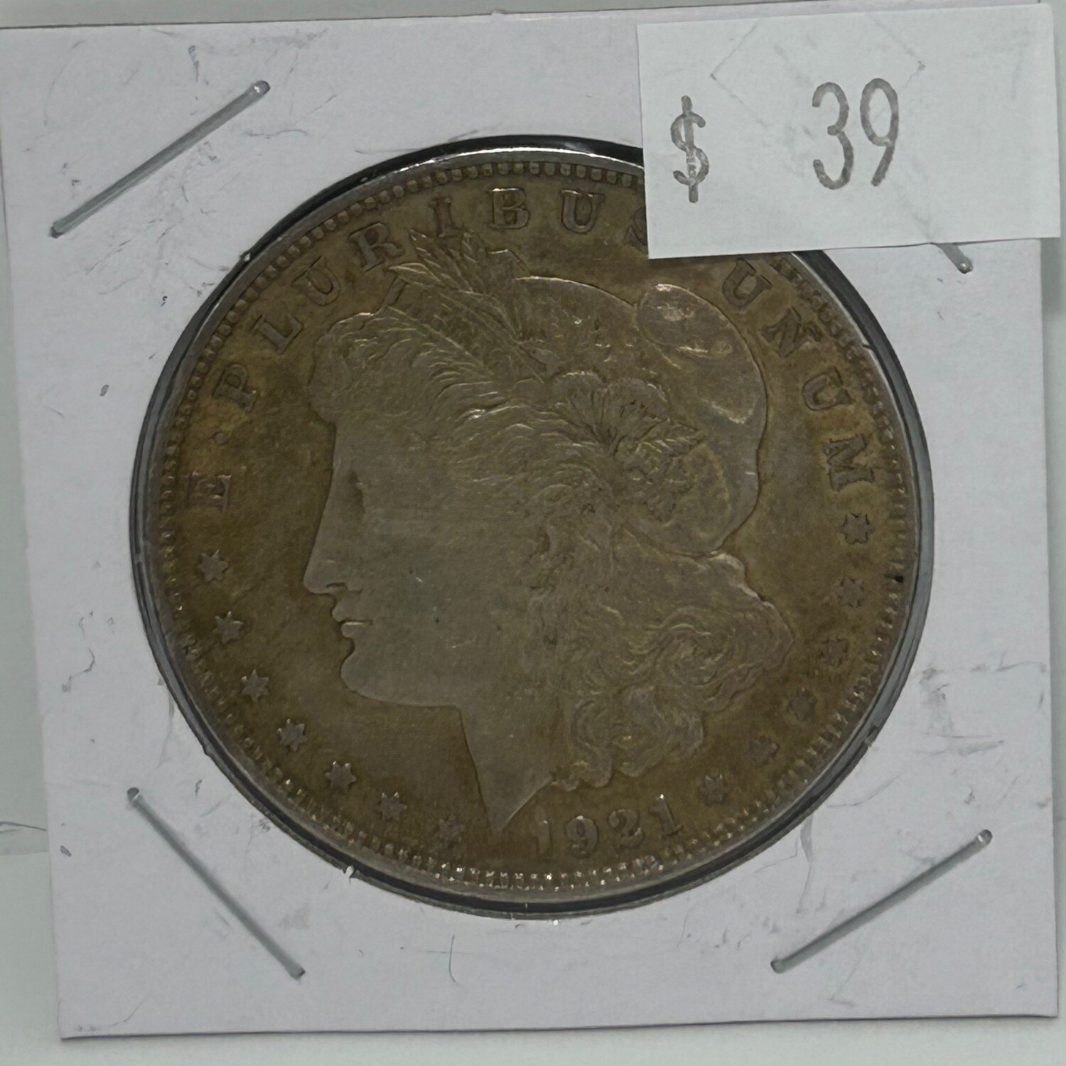 1921 Morgan Silver Dollar in cardboard protector