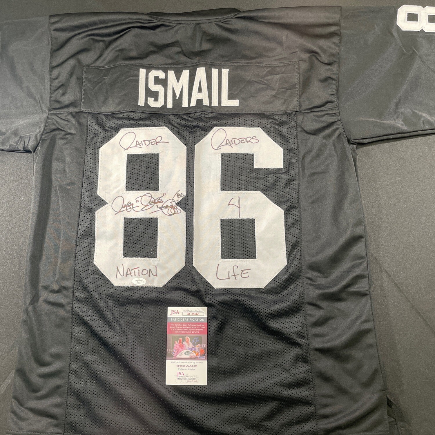 Rocket Ismail Oakland Raiders Autographed Jersey(Full Signature) w/Raider 4 Life JSA Authenticated