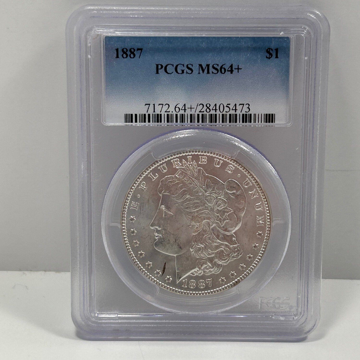 1887 1$ PCGS MS64+