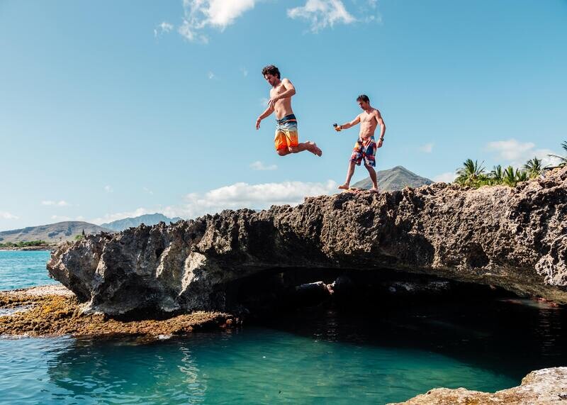 Mermaid Caves and West Oahu Tour with Ka’ena Point Hike, Disney resort, swim and rum distillery