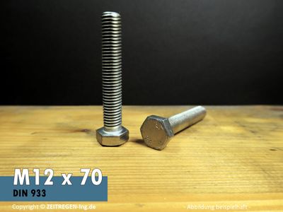 Zwei Sechskantkopf-Schrauben auf Werkbank