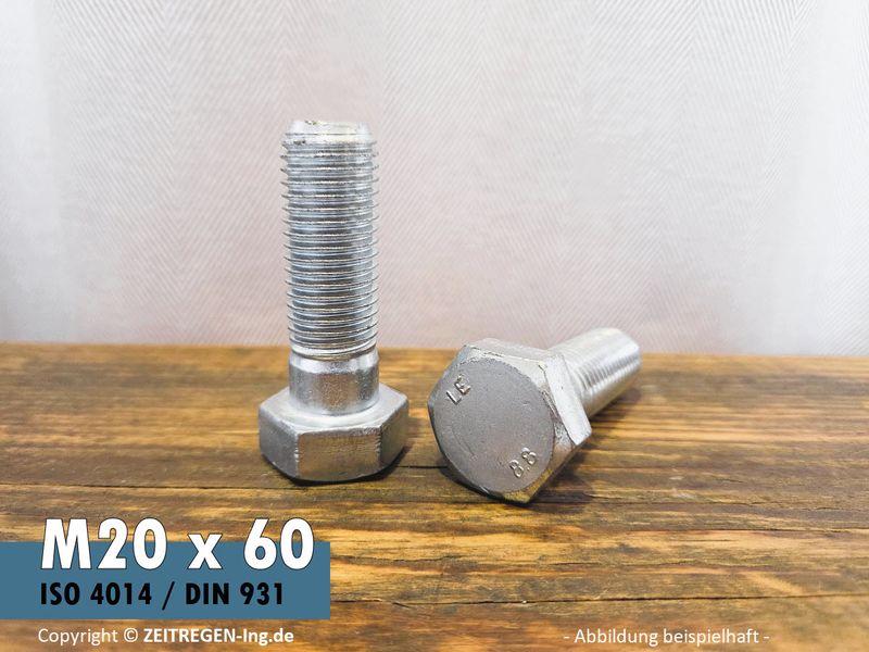 Zwei silbrige Sechskantschrauben auf Werkbank