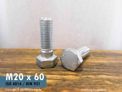 Zwei silbrige Sechskantschrauben auf Werkbank