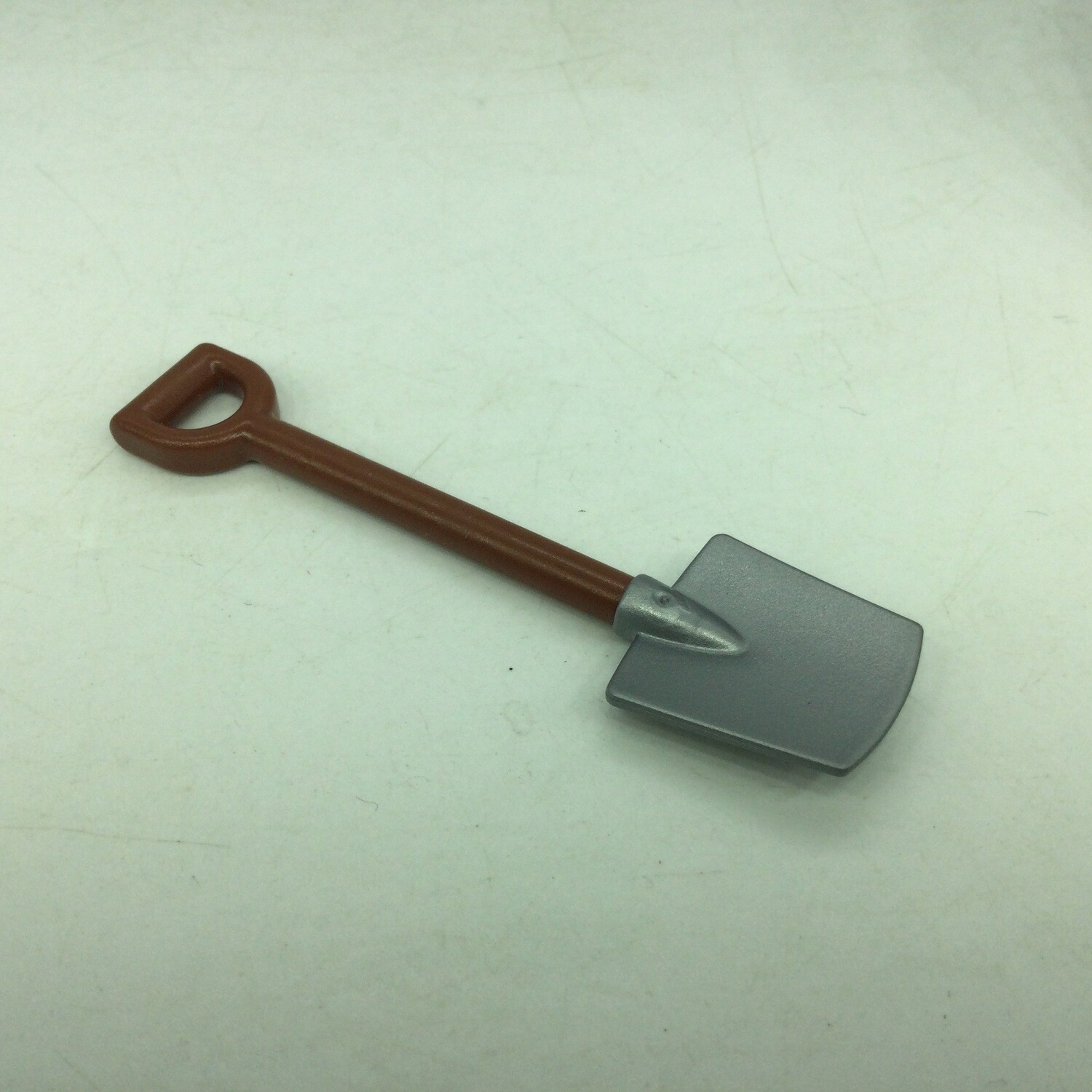 playmobil pelle manche marron