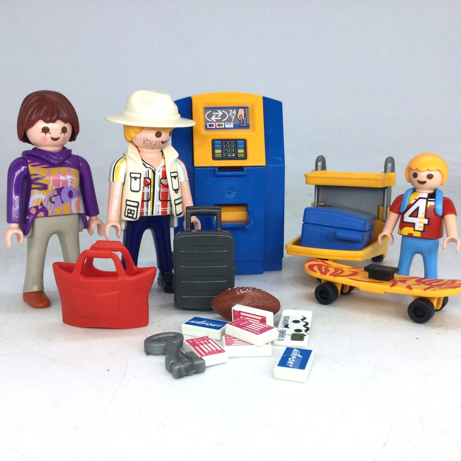playmobil famille au distributeur de billet