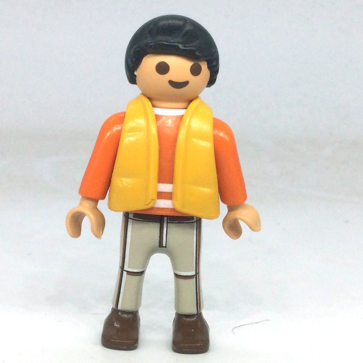playmobil garçon doudoune jaune