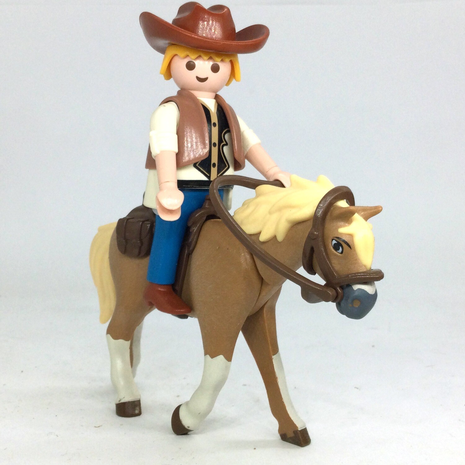 playmobil cow boy a cheval