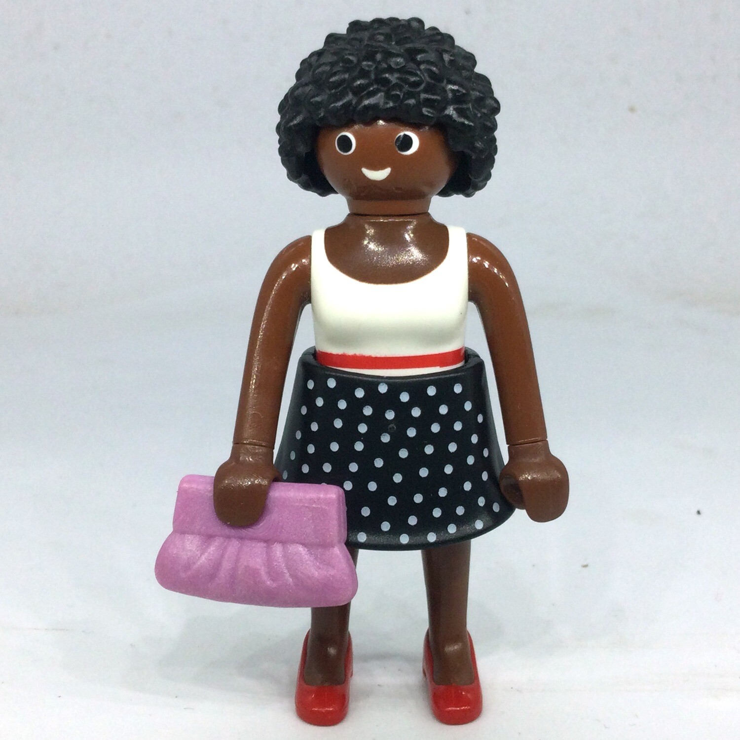 playmobil femme black jupe pois