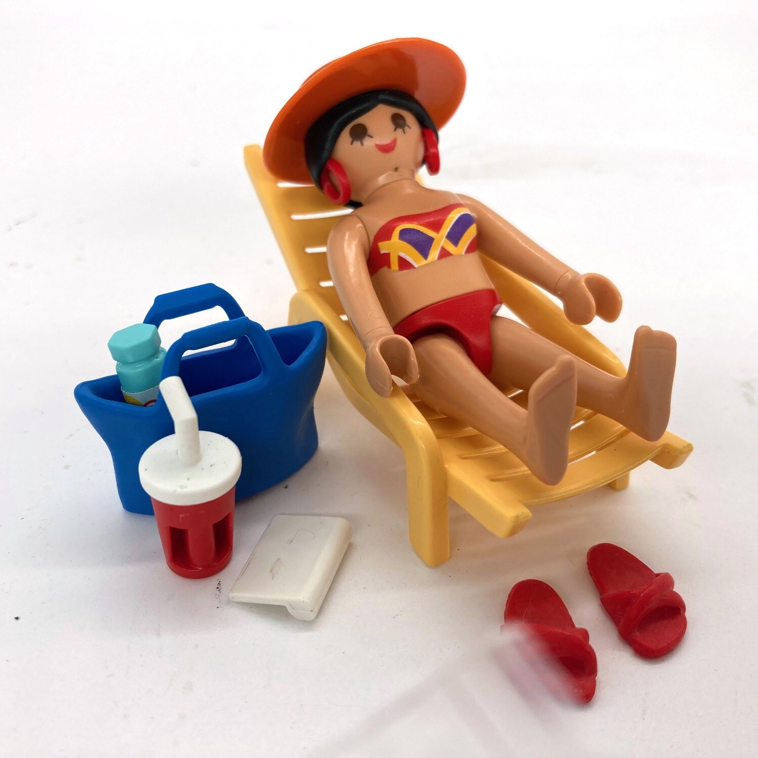 playmobil femme plage transat jaubne