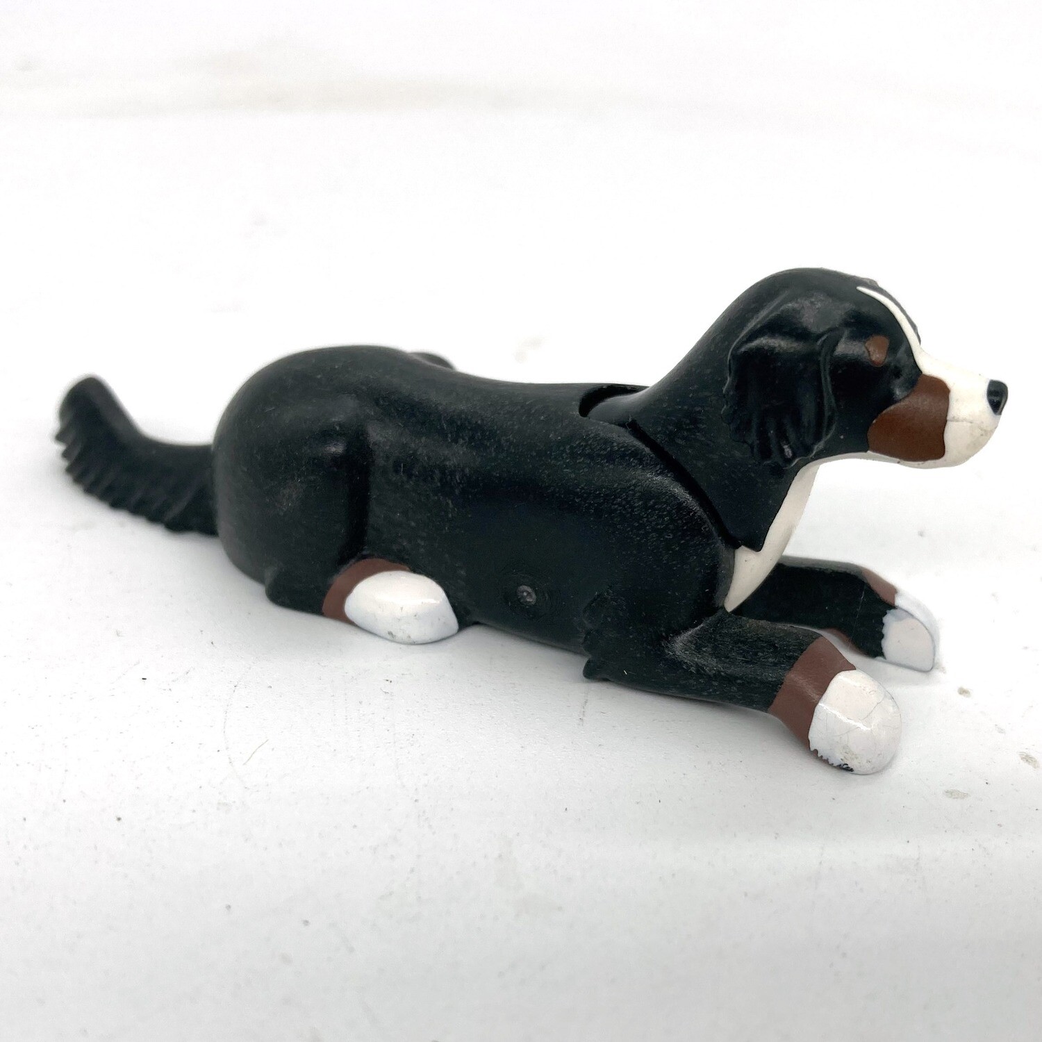 playmobil chien bouvier allongé