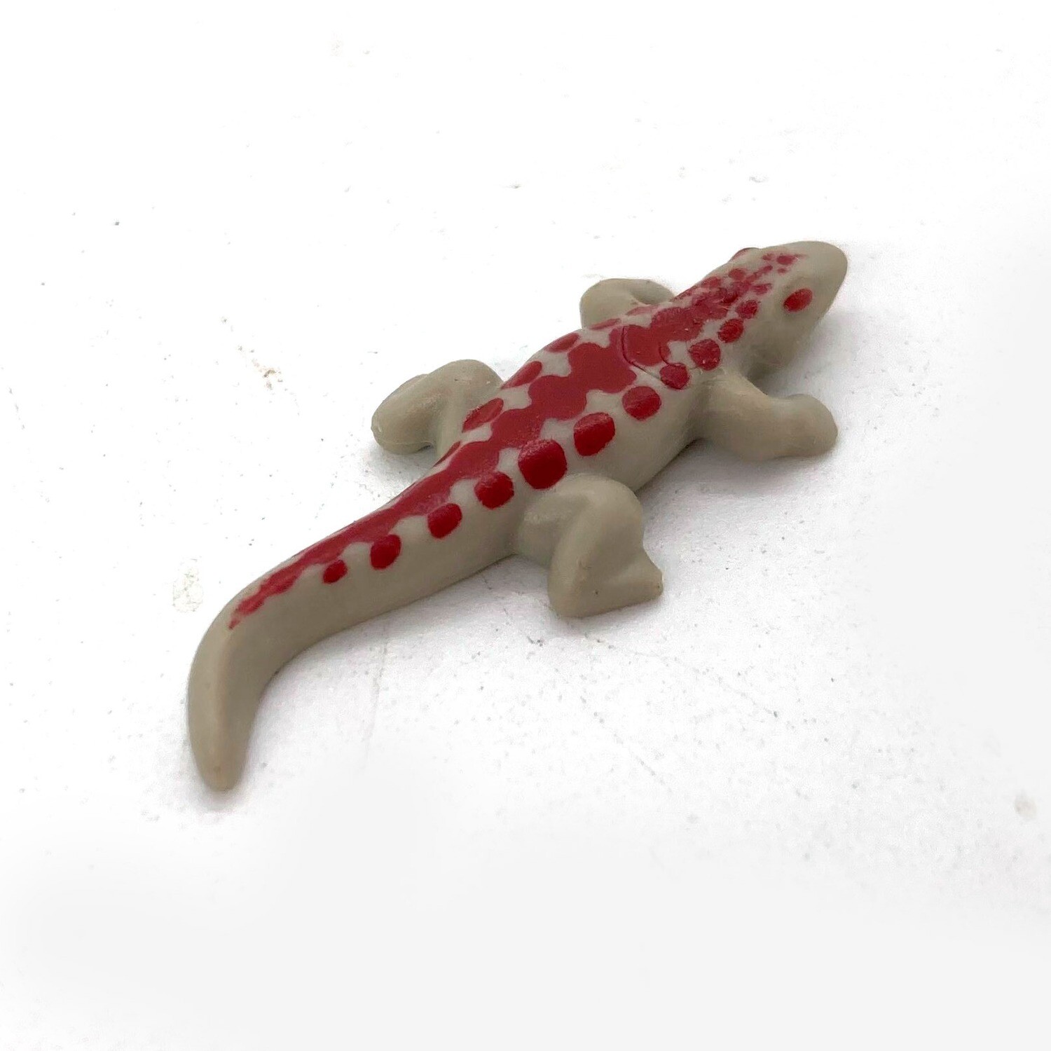 Playmobil petit lézard gris et rouge