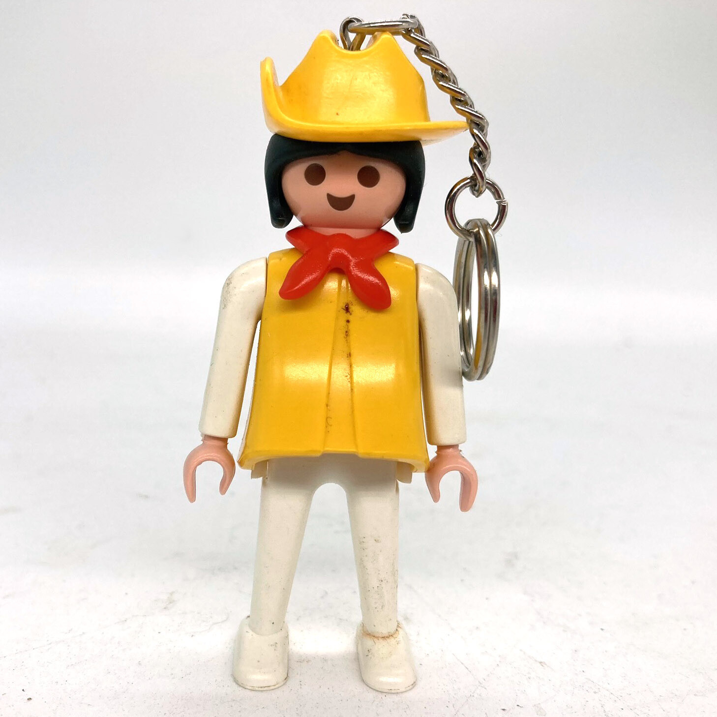 Playmobil porte clé femme jaune