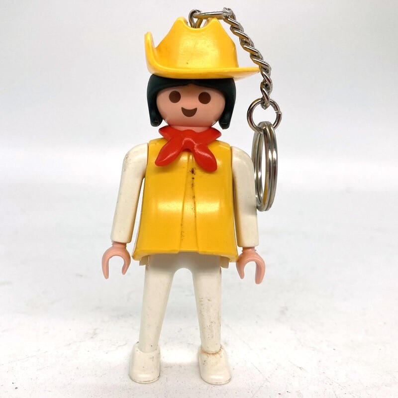 Playmobil porte clé femme jaune