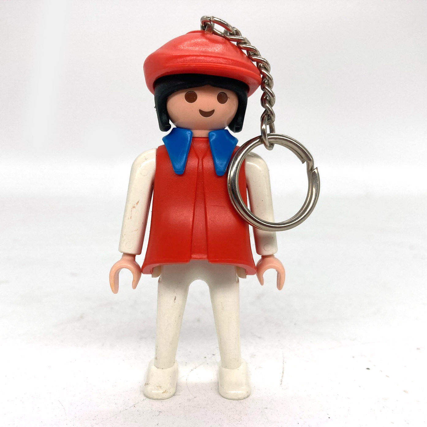 Playmobil porte clé femme rouge