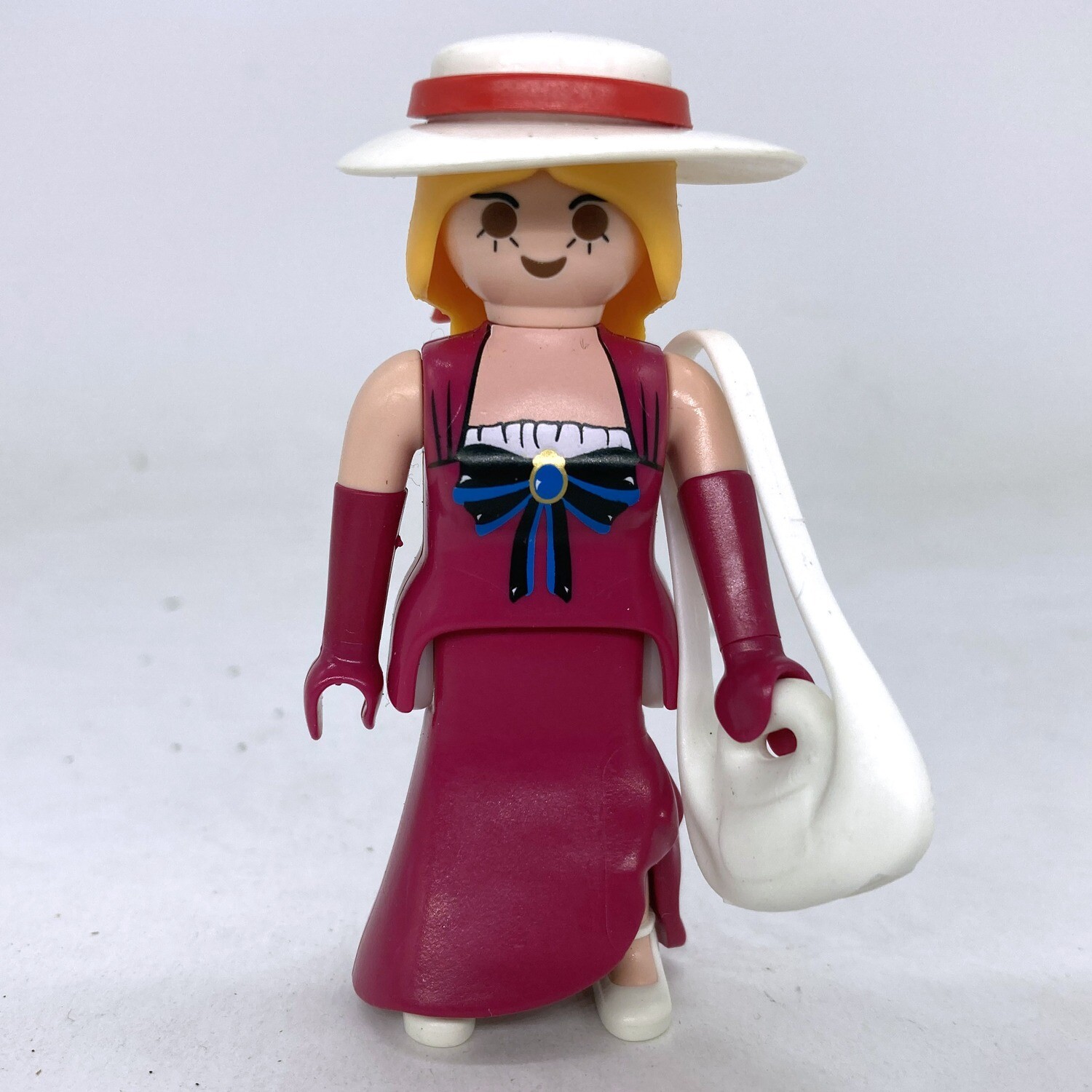 playmobil femme robe rose sac