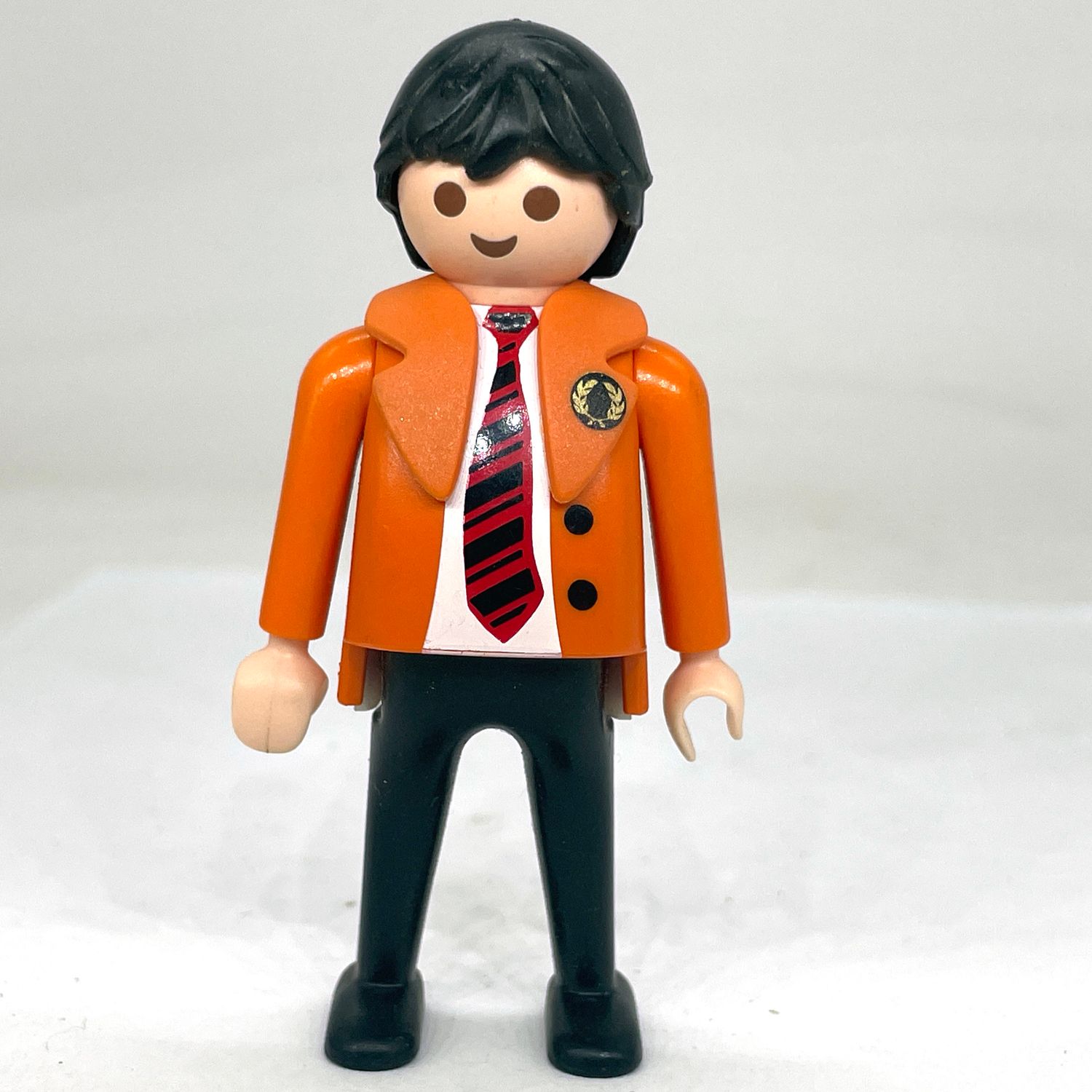 playmobil homme en costume orange