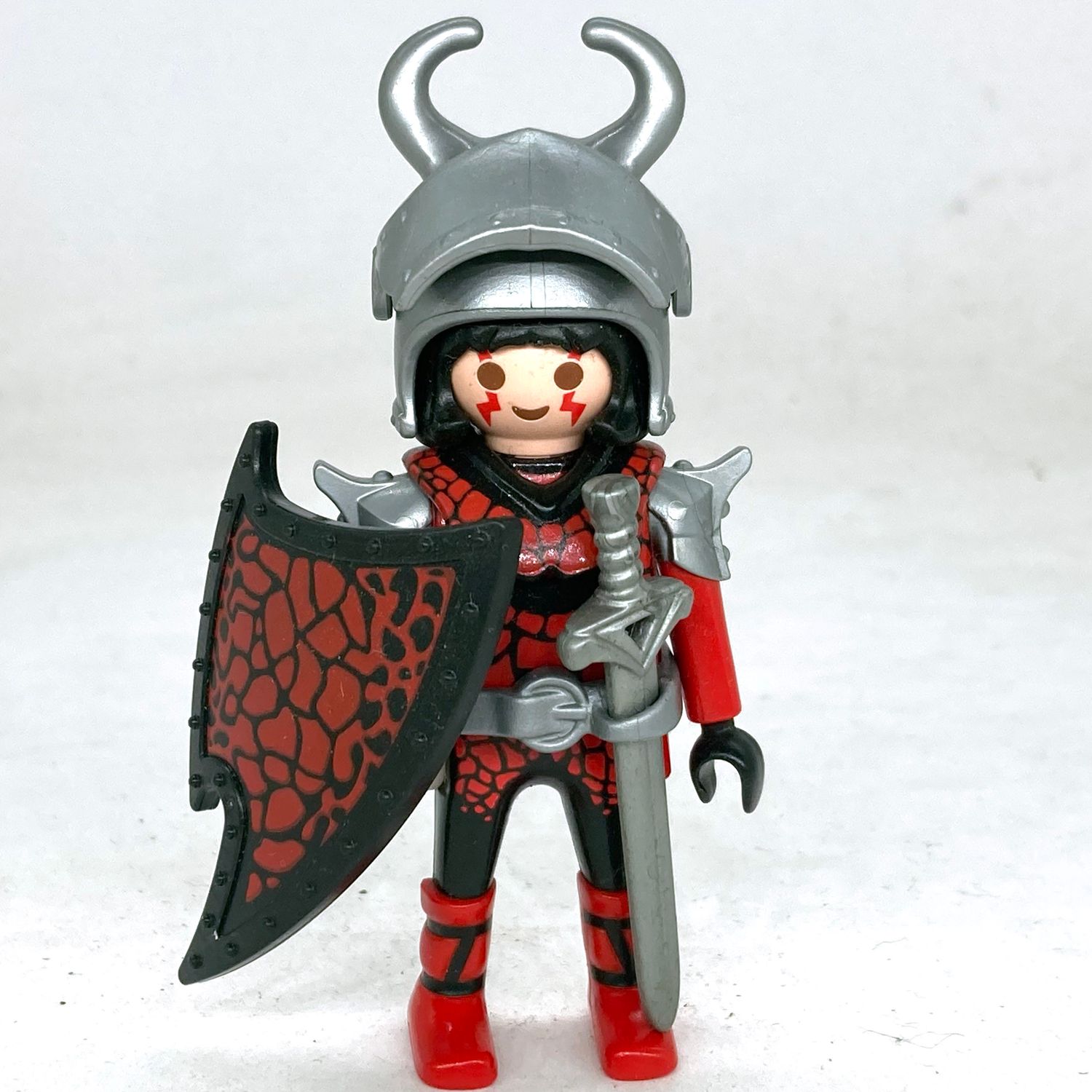 playmobil chevalier maléfique rouge