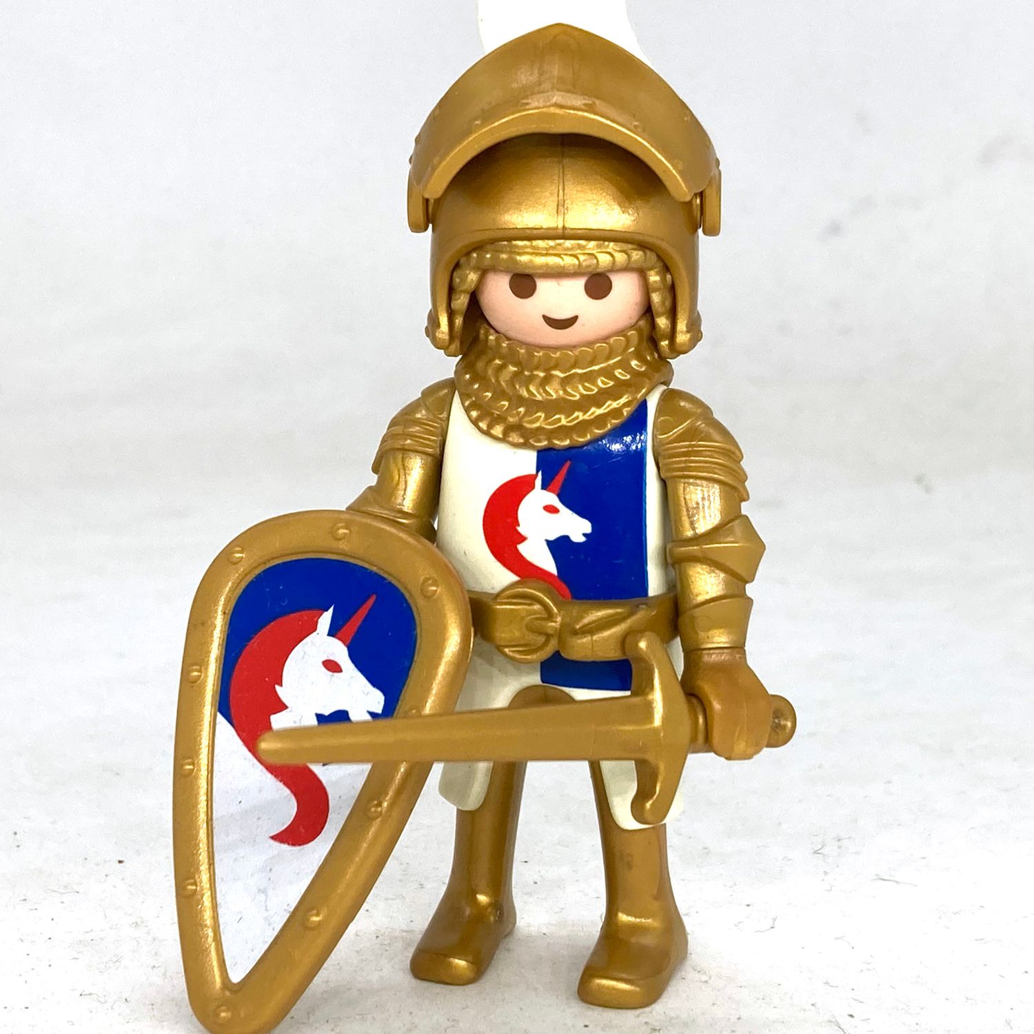 playmobil chevalier licorne or