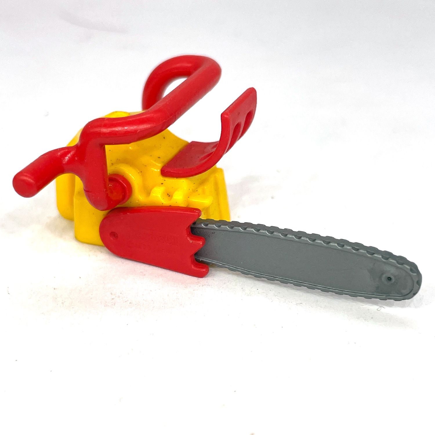 playmobil tronçonneuse jaune rouge