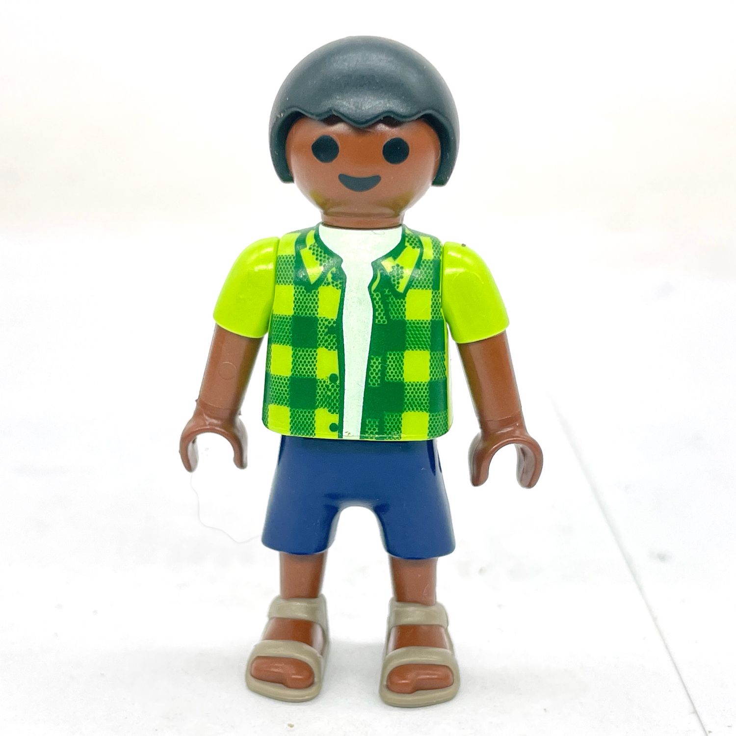 playmobil enfant black en vert