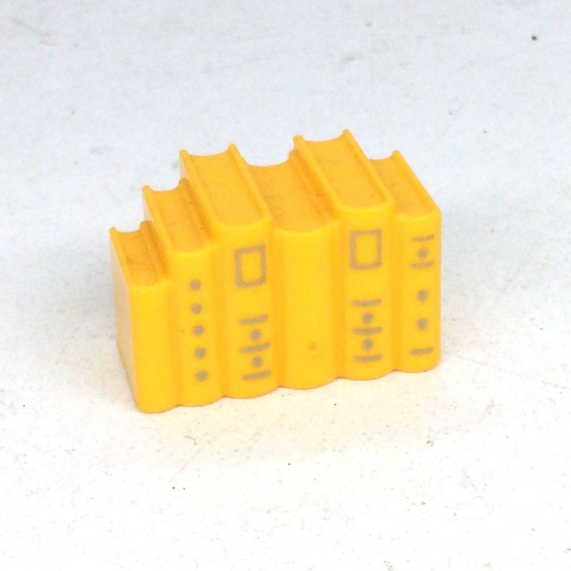 playmobil livre jaune reliure or