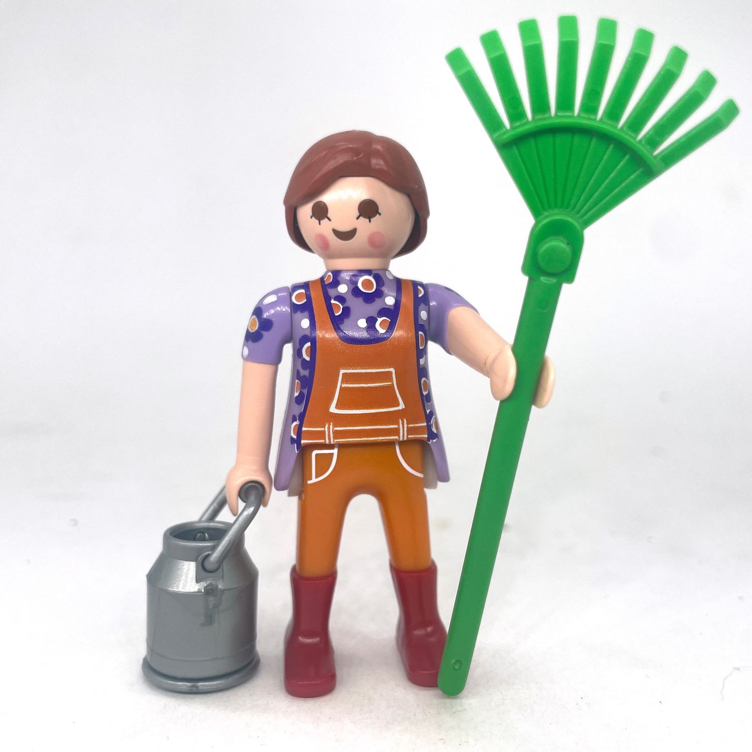playmobil fermière au rateau