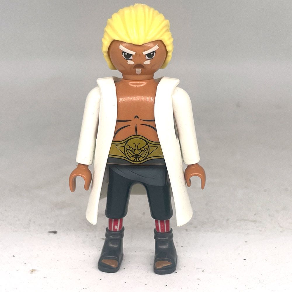 playmobil catcheur blond manteau blanc