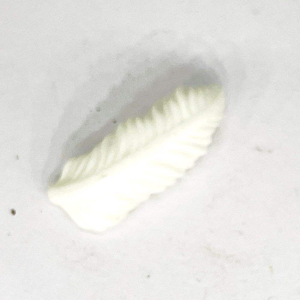 Playmobil plume  blanche allongée