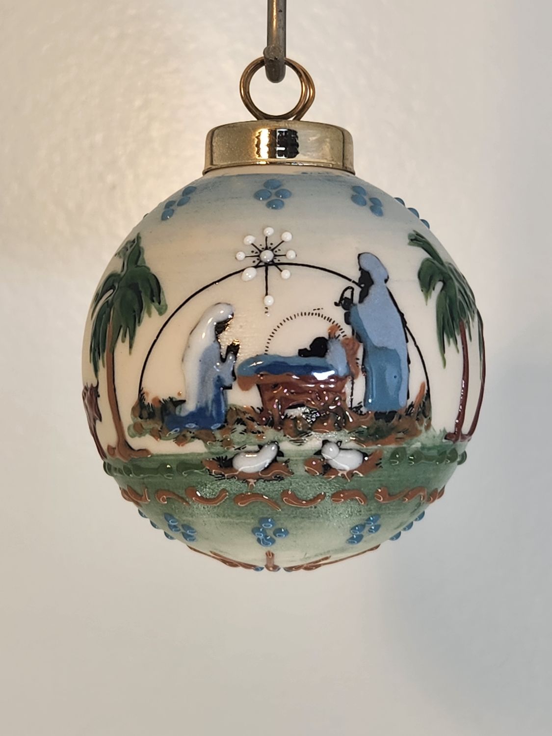 Ivory Ball with Nativity 2 Images 2.5"