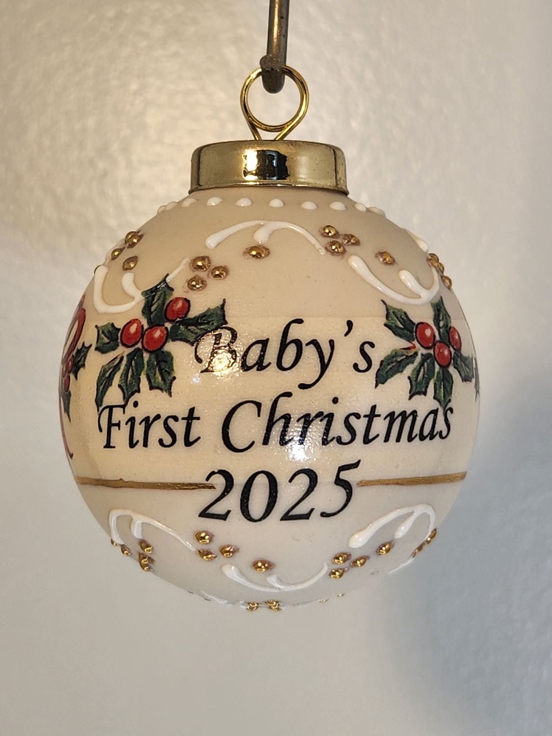 Ivory Ball with Baby's First Christmas Holly and Ribbon 2.5"