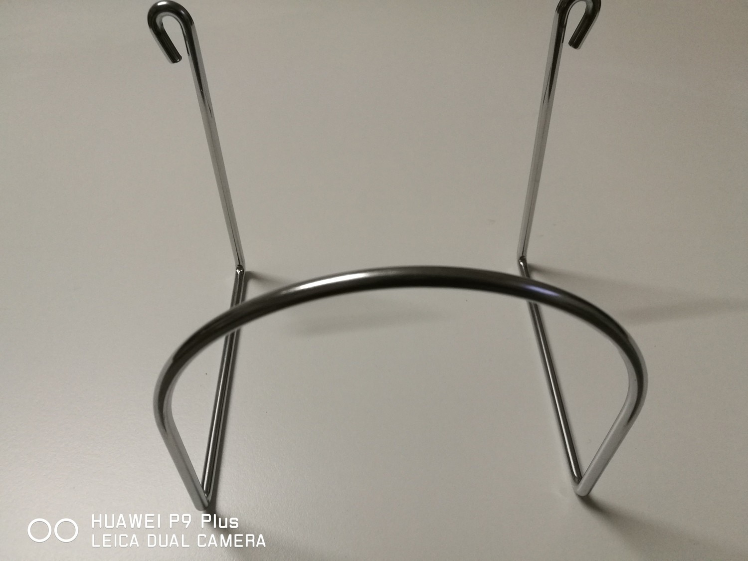 Gancio appendi tubo flessibile