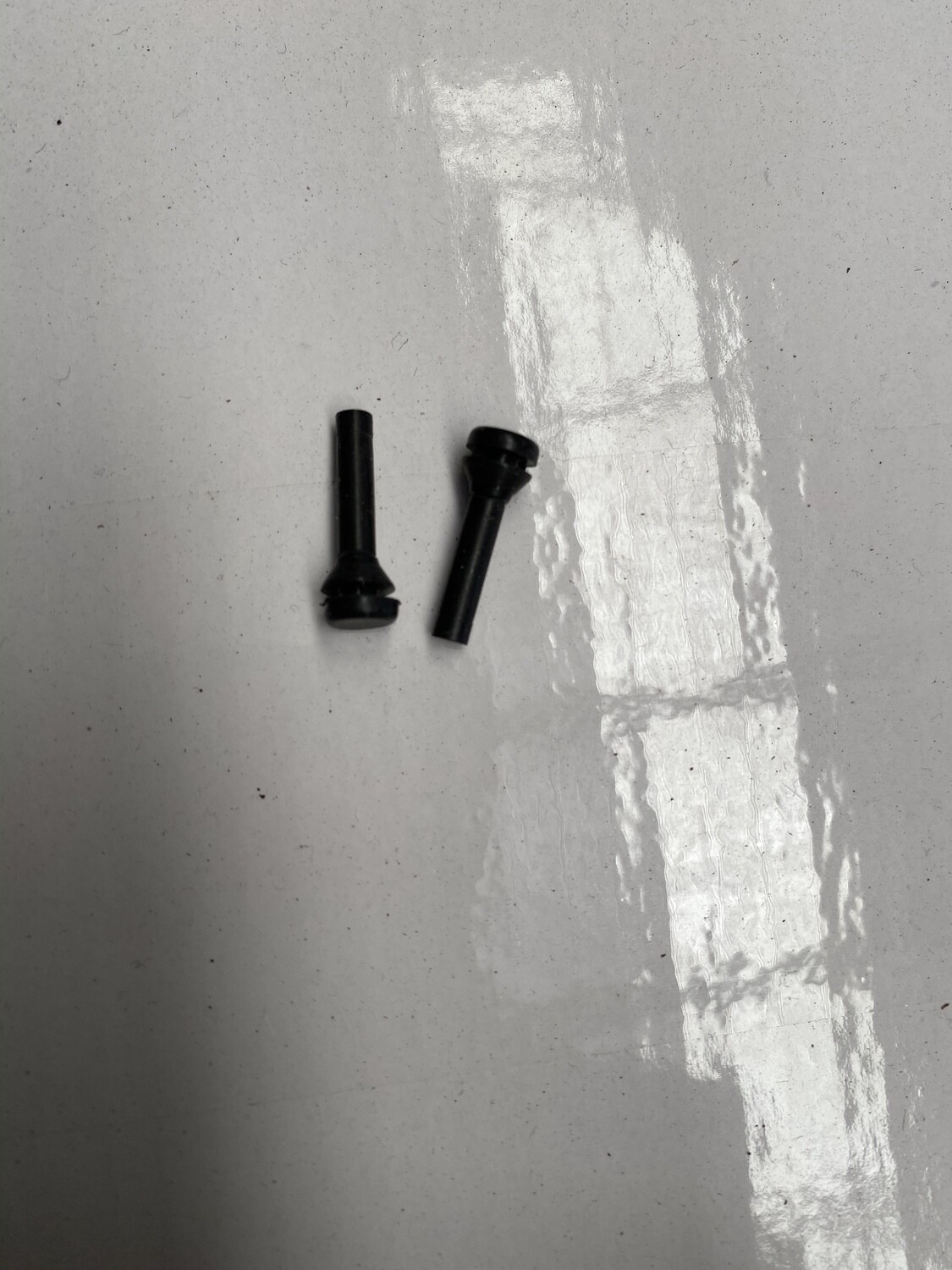 Petrol lid bump stops