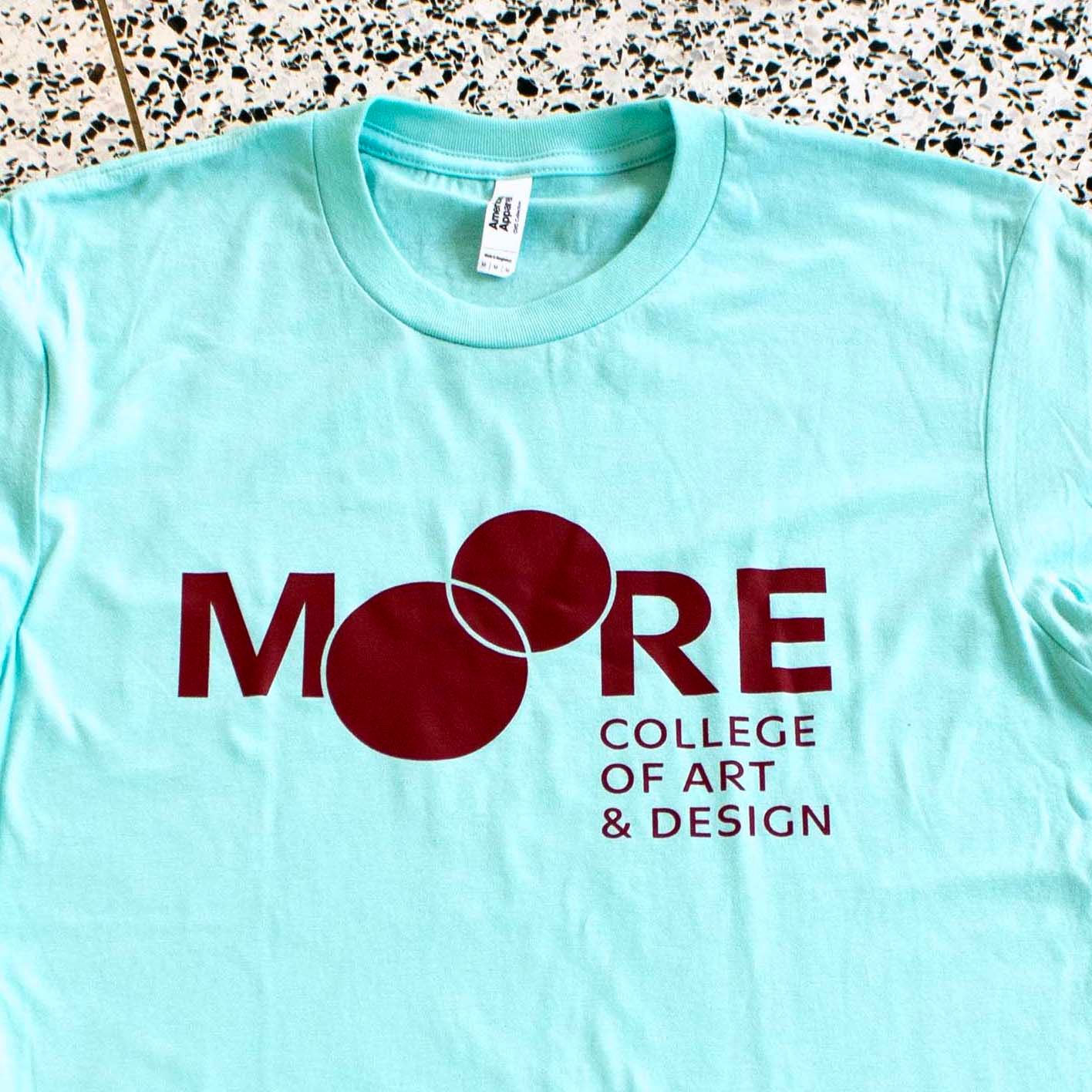 Moore Tee: Celadon Burgundy Logo