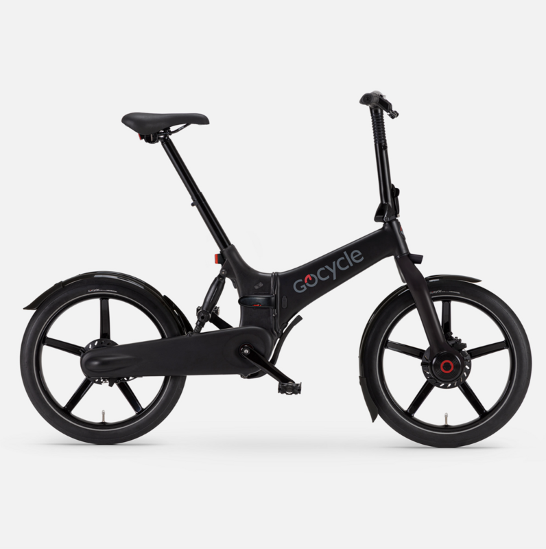 Gocycle G4i, premium folding electric bike, showing off its innovative gray magnesium frame and unique folding system for easy transportation, perfect for urban commuters looking for style and performance.