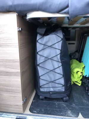 folding bike in the hold of a camper van | velo pliant en soute de camping car