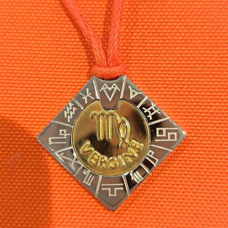 Collana in acciaio e oro 18 kt Vergine - COMETE