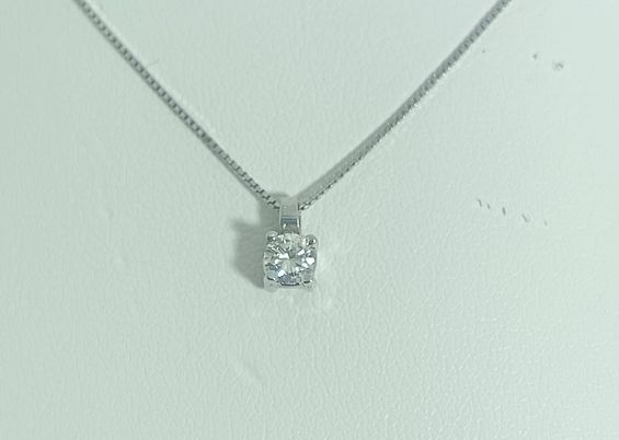 Punto luce con diamante ct 0,13. Oro bianco 18 kt - ROSAS