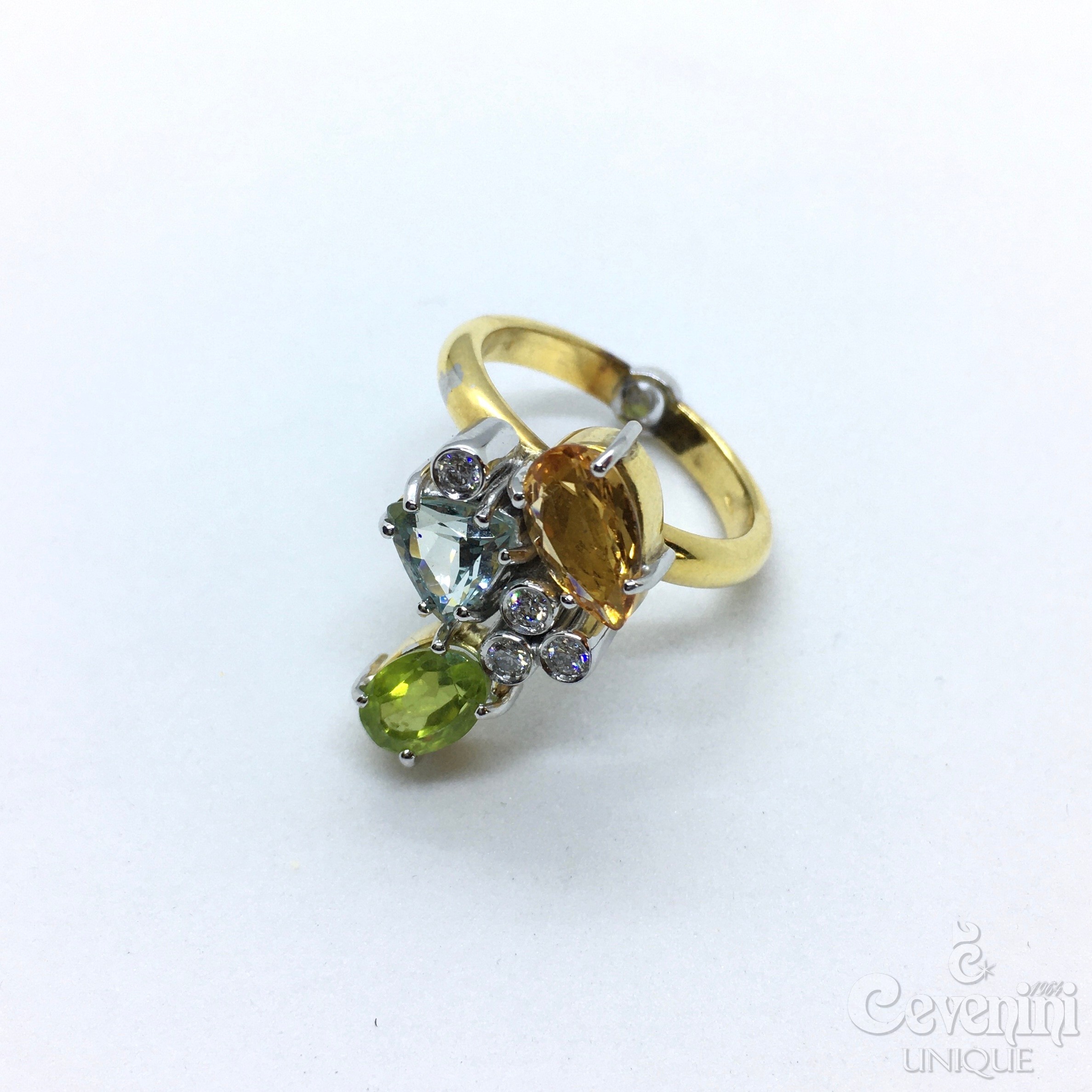 ANELLO GLICINE CEVENINI UNIQUE ORO GIALLO E BIANCO 750‰ CON DIAMANTI, ACQUAMARINA TOPAZIO E PERIDOTO