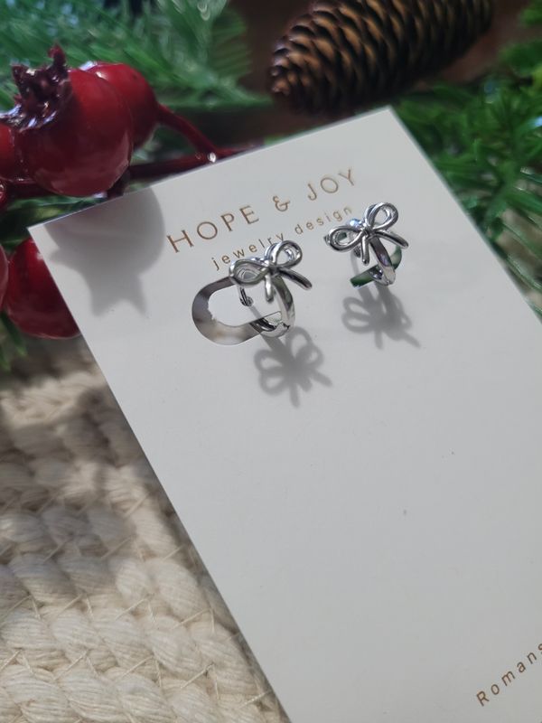 Rhodium-Plated Bow Huggies