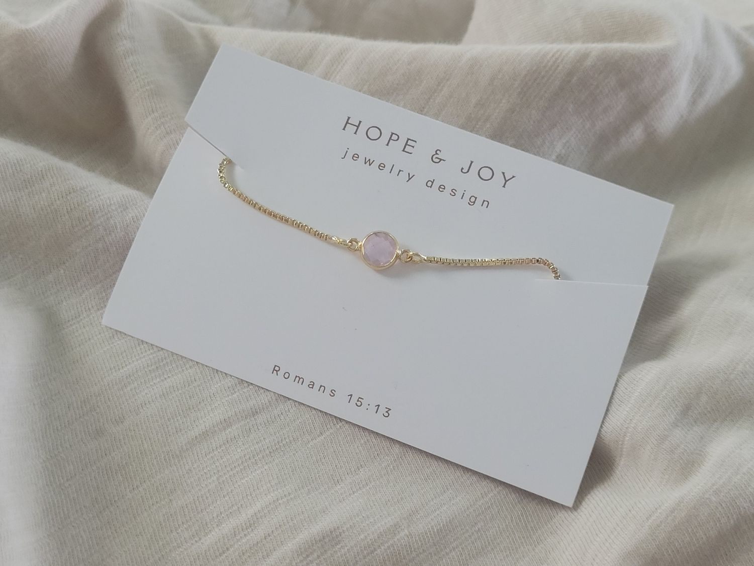 Gold Bracelet with Pink Cubic Zirconia Charm